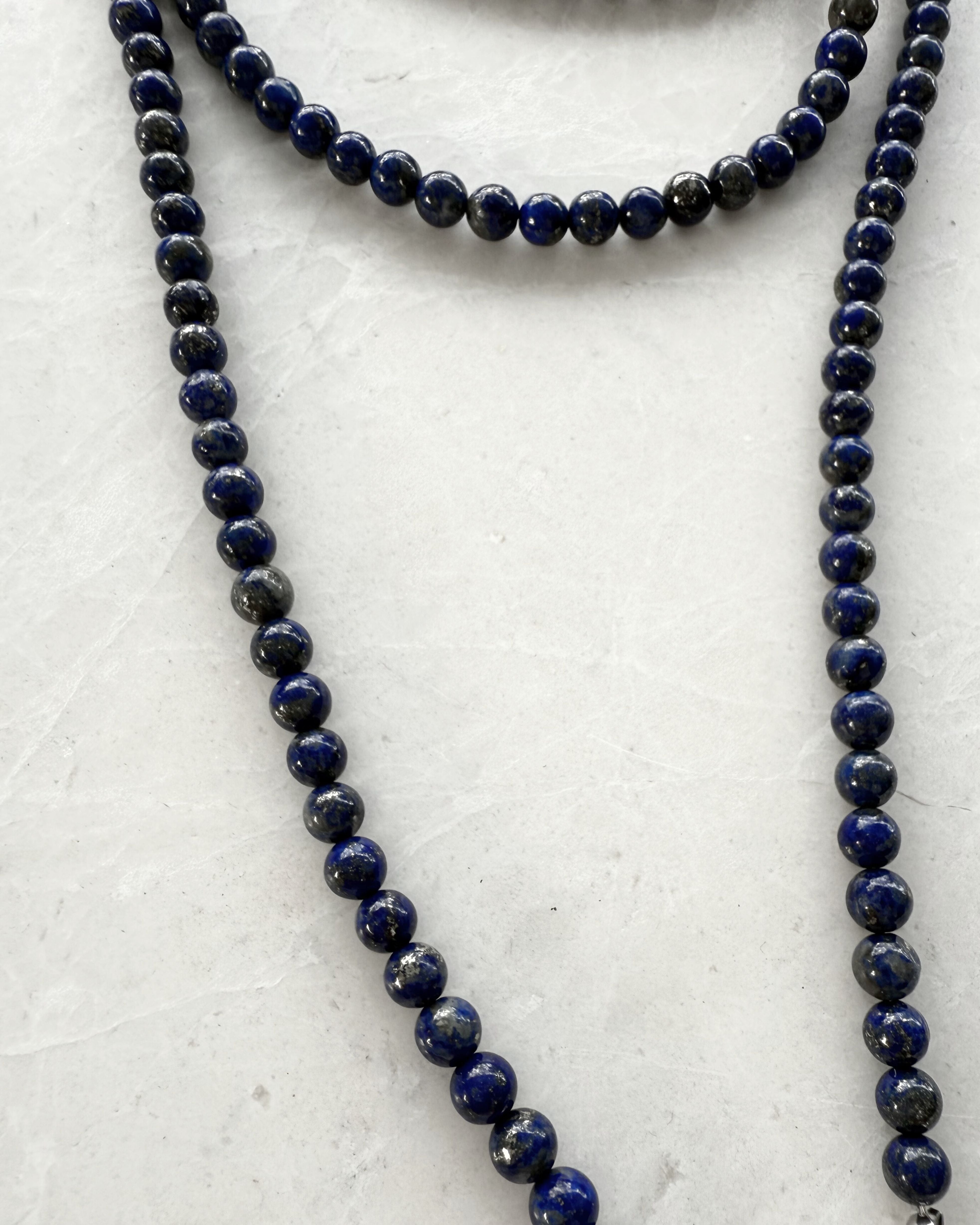 Close up La[is lazuli beaded phone carrier