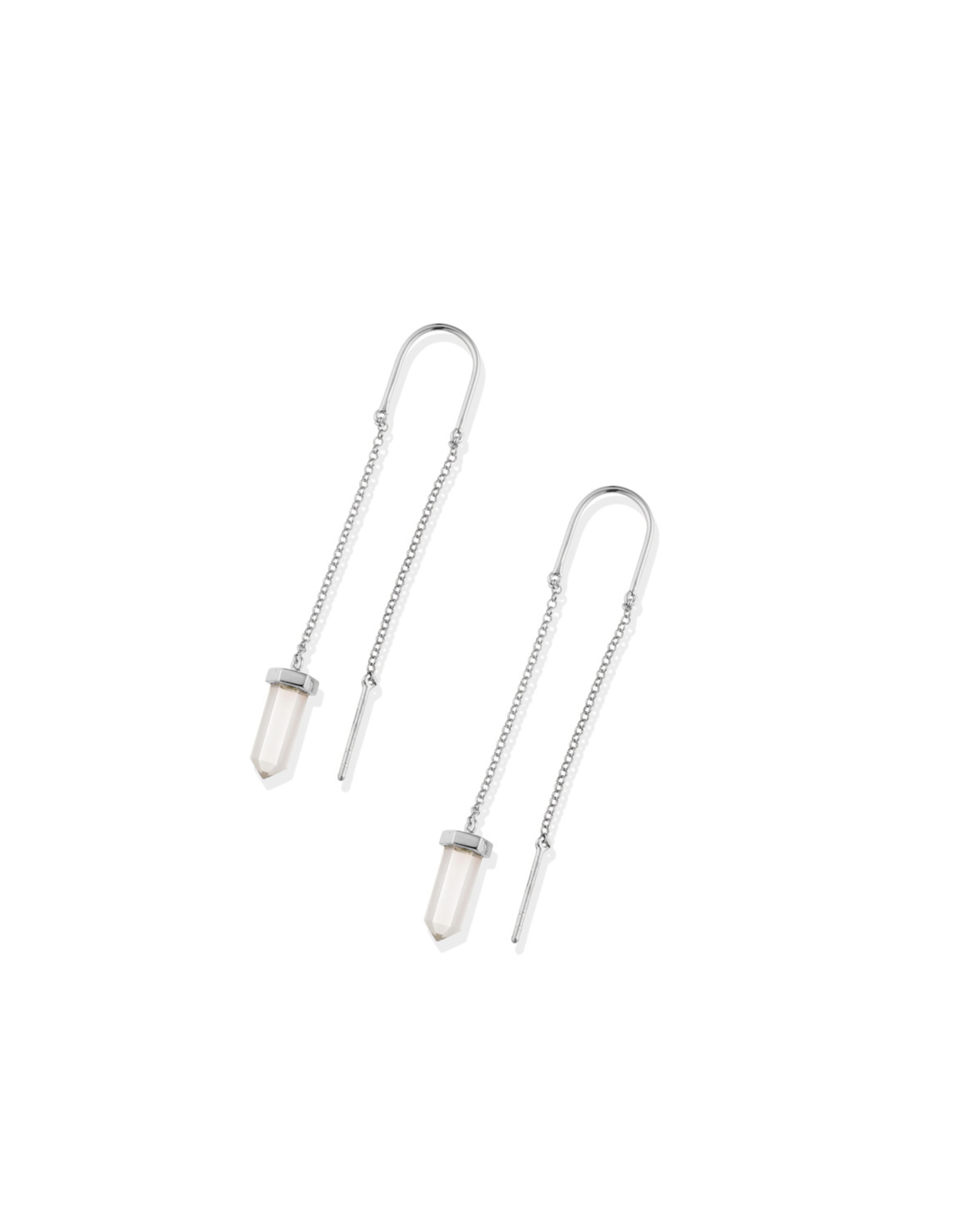 Pair of silver chain earrings on a white background