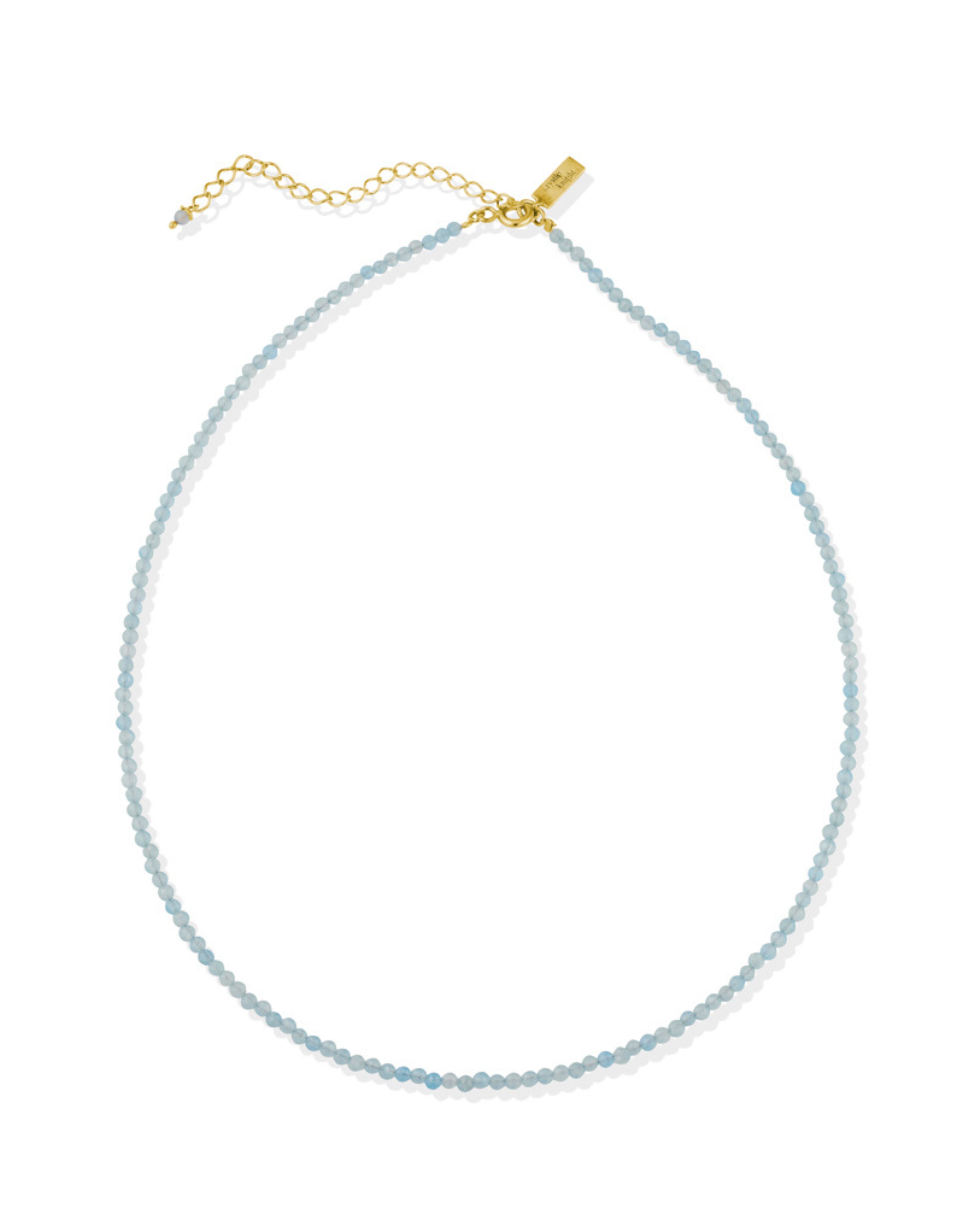 Necklace with Aqua Marine beads and gold clasp on a white background